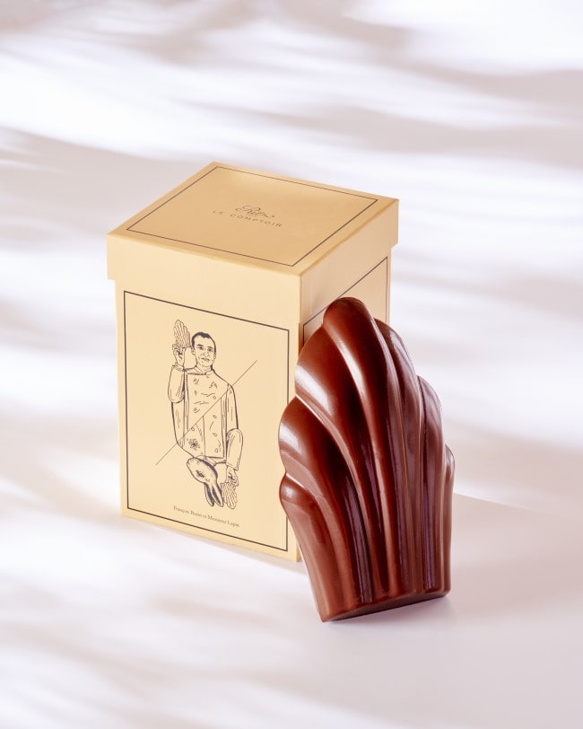 Easter Madeleine promotional photo in front of a box